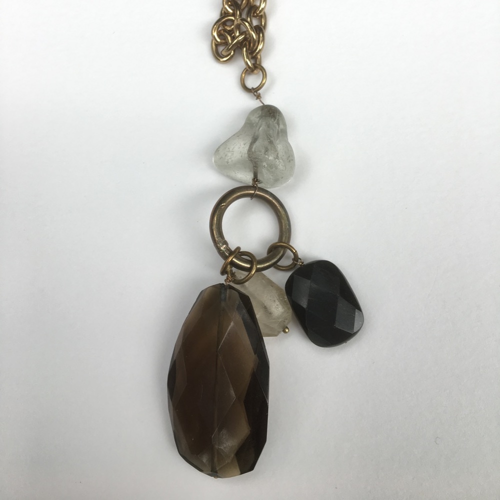 long chain necklace with stone pendants